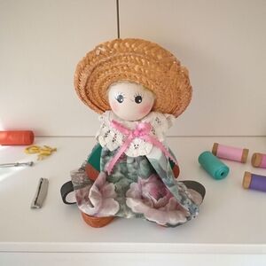 Handcrafted Doll with Floral Dress and Straw Hat